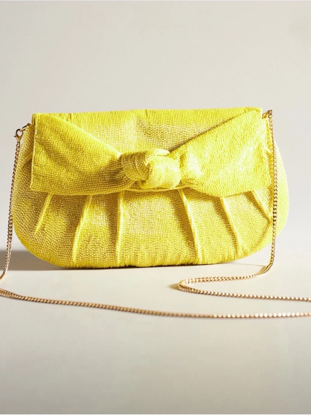 Maeve Beaded Bow Clutch in Yellow
